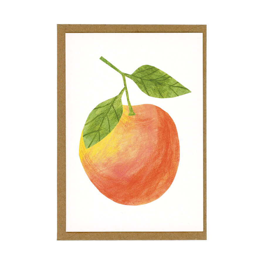 A red and yellow apple illustrated greeting card displayed with a brown envelope