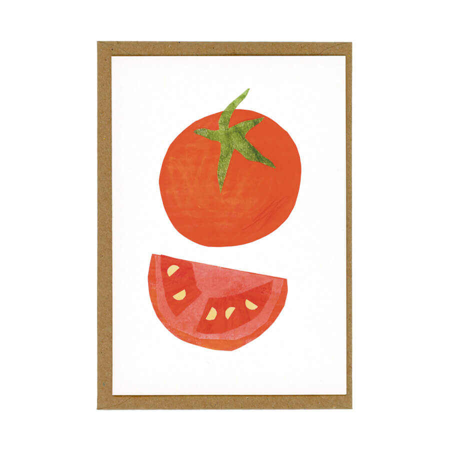 a illustrated greeting card of a big tomato on a white background displayed on top of a brown envelope