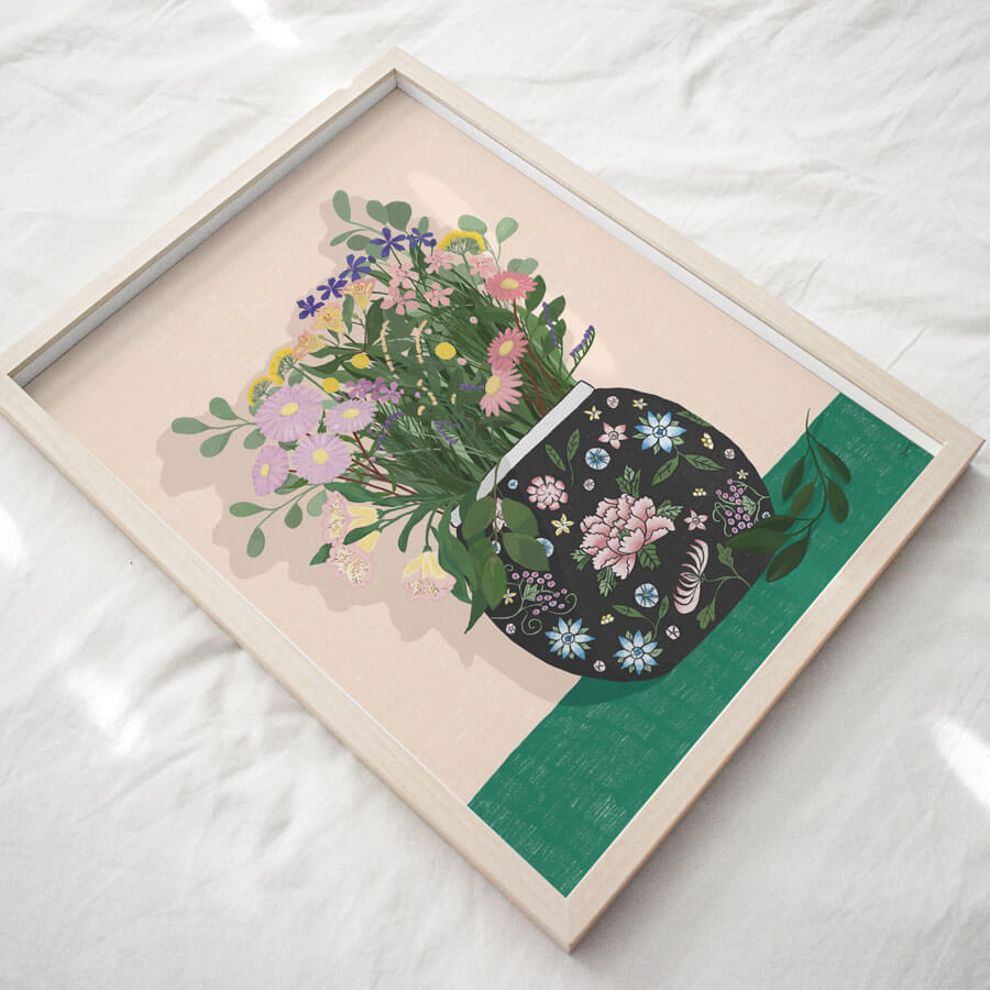 A framed giclee of a bunch of flowers in a vase printed on eco friendly fine art paper