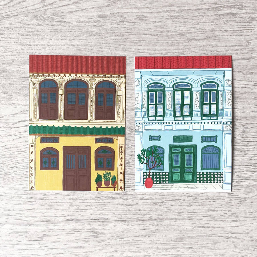 A yellow and green heritage shophouse front in recycled postcard form 