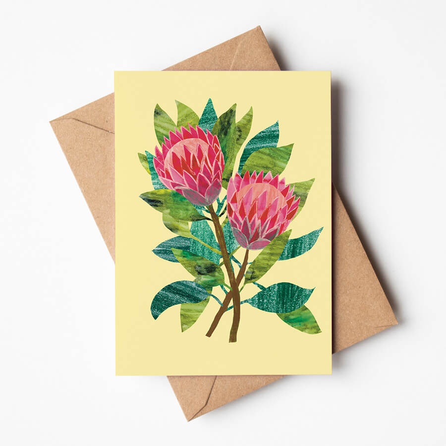 An eco friendly greeting card with a picture of two mixed media pink protea flowers on a yellow background